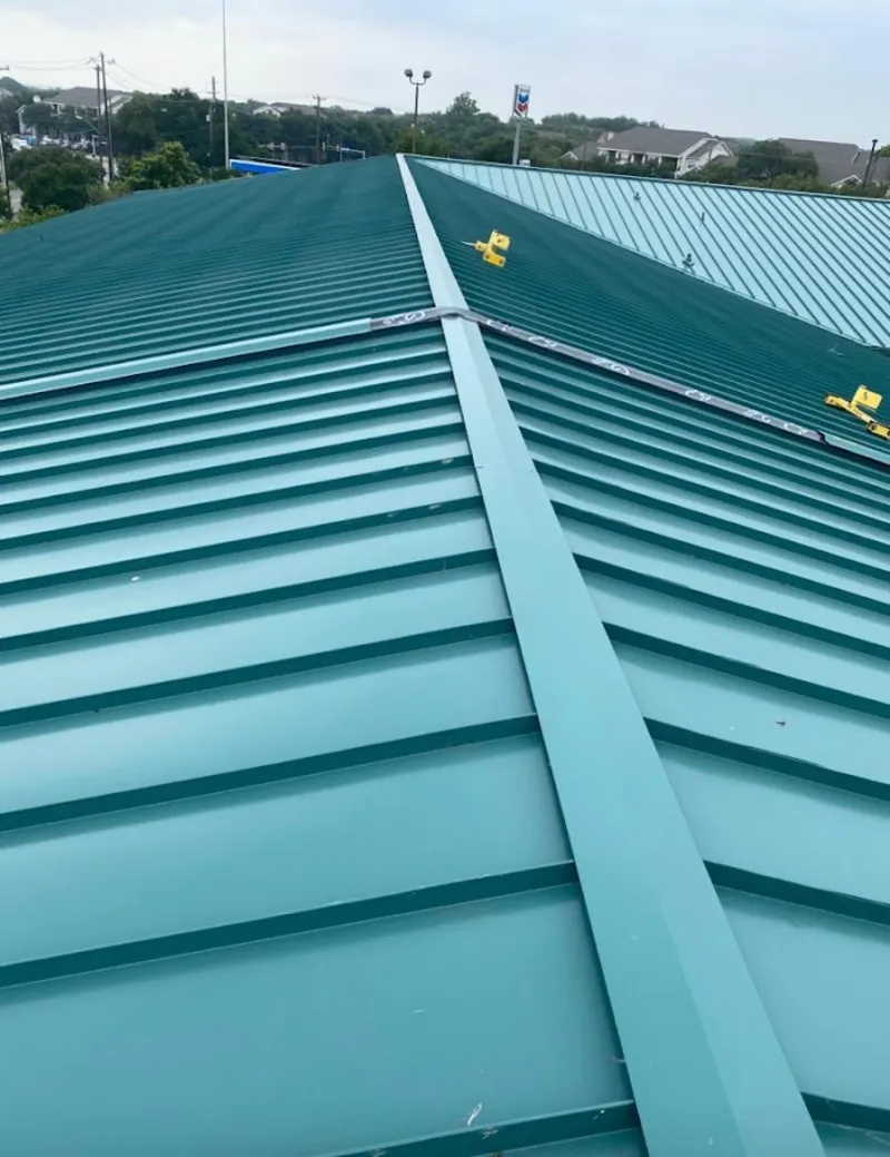 Green commercial metal roof ridge and valley for Metal Roof Repair in Arbutus